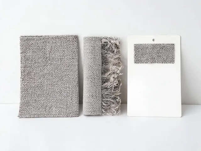 Woven upholstery fabric with abrasion specimen